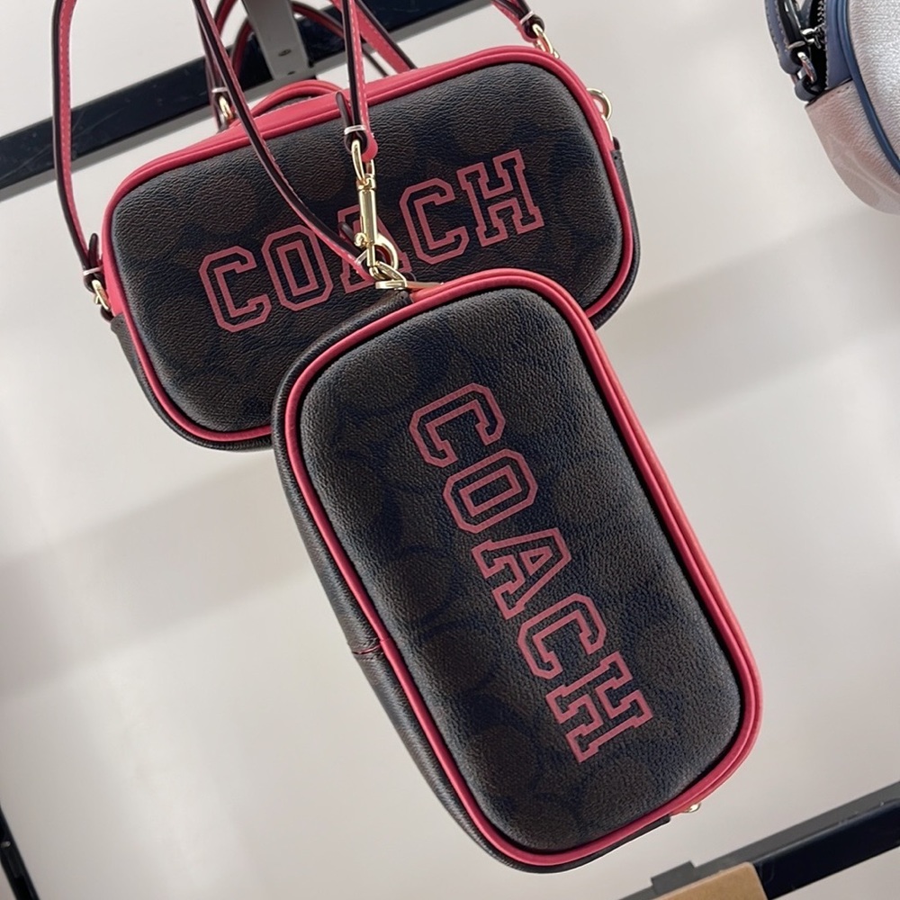 Coach Jamie Wristlet In Signature Canvas With Varsity Motif
IM/Brown/Watermelon - Picture 15 of 16